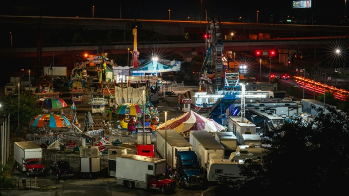 An aerial view of a carnival at night